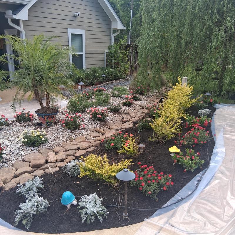 Rewired accent lighting after the flower bed was refurbished in Florence, MS