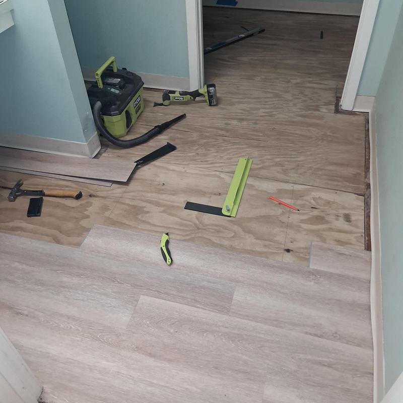 Installs laminate vinyl plank flooring and applies toilet paint in Pearl, MS