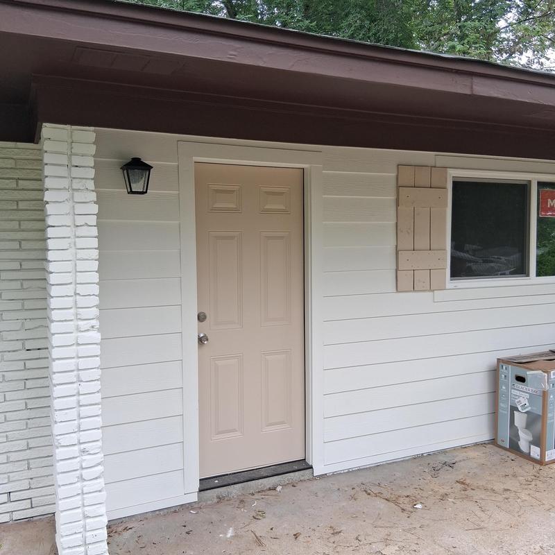 Installed exterior lighting and hung shutters over brick windows in Pearl, MS