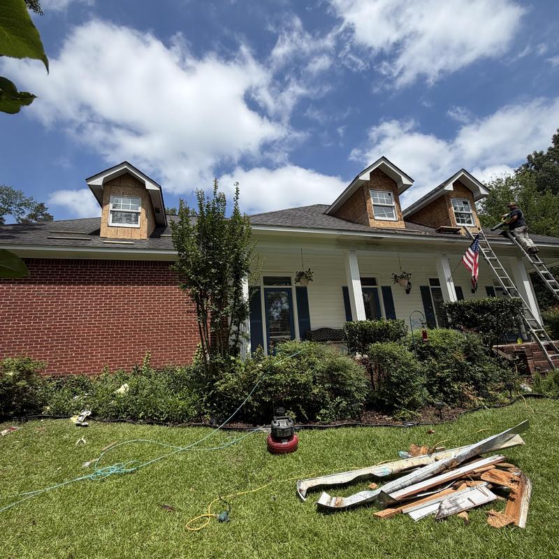 Removes old siding and installs new siding on dormers in Madison, MS