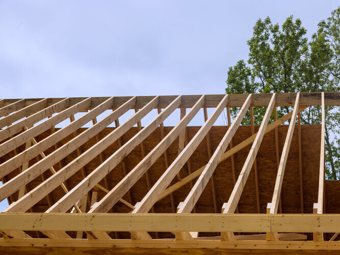 Timber wooden truss frame beam house stick built home under framework construction new build