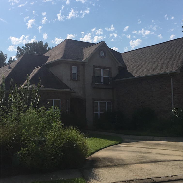 new shingles on a nice home's roof